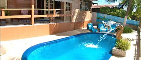 Outdoor pool, pool umbrellas, pool loungers