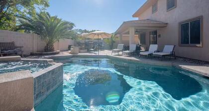 Custom home with 5 Beds & 5.5 Baths! A heated pool & spa make the backyard feel like a resort