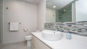 Bathtub, hair dryer, towels, soap