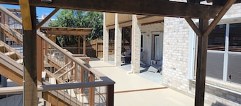 Bottom Level Canal Water Front Home with Spacious Deck, Boat Dock, and Parking!