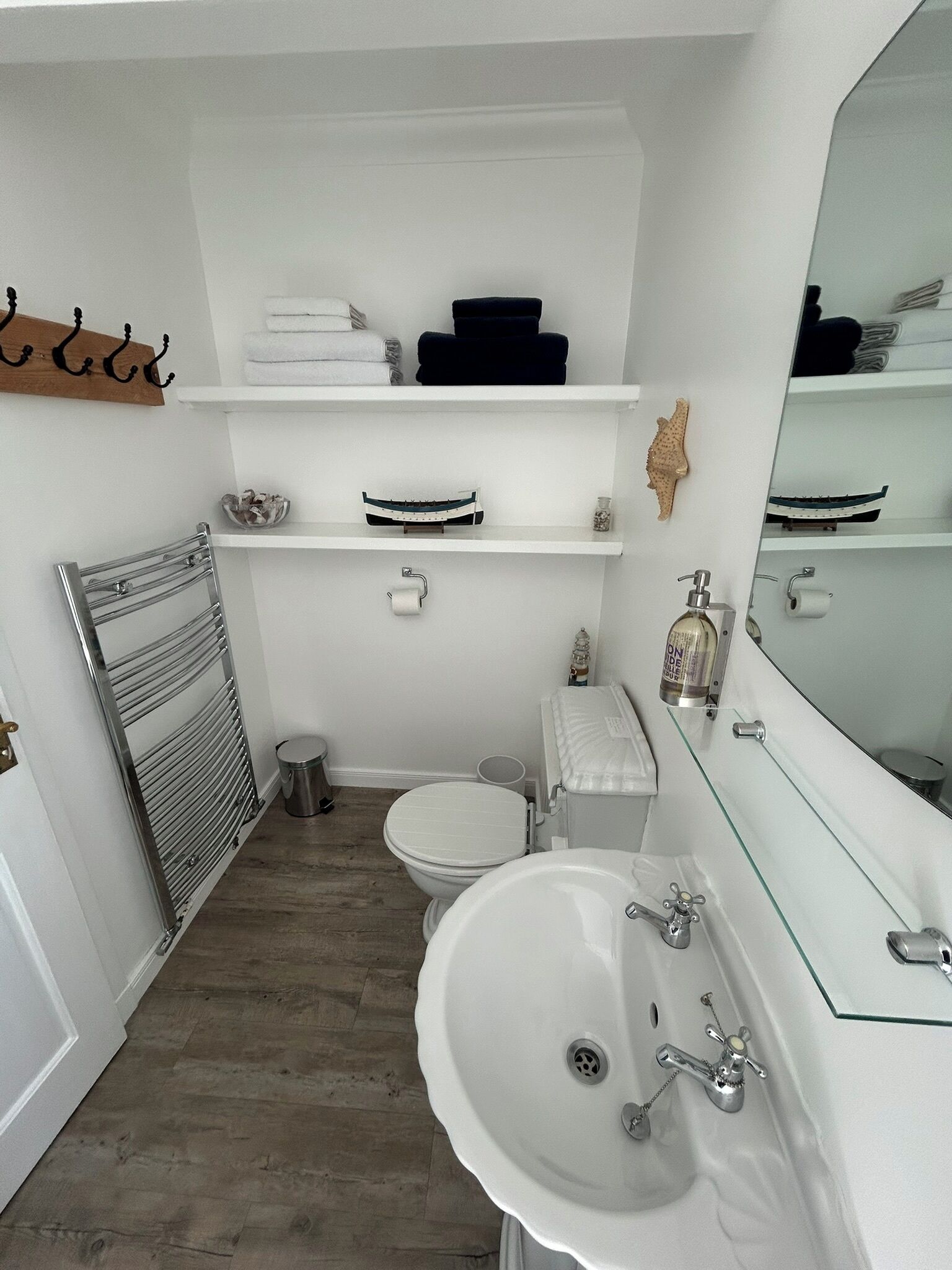 Main bathroom downstairs - Shower, washbasin, toilet & heated towel rail.