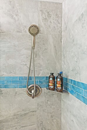 Shower, hair dryer, towels, toilet paper
