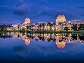 A hotel with two large, illuminated domes and a reflection in the water. - Minutes from Disney - Beautiful 3/2 Pool Villa with WiFi in Hampton Lakes  (Davenport)