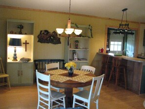 The dining room and the breakfast bar.