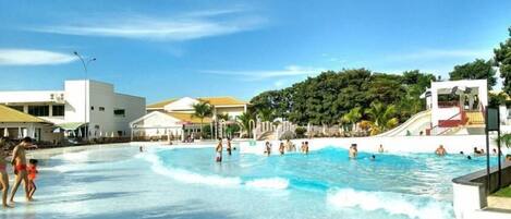 15 outdoor pools, pool umbrellas, pool loungers