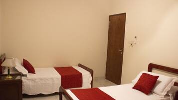 2 bedrooms, blackout drapes, iron/ironing board, rollaway beds