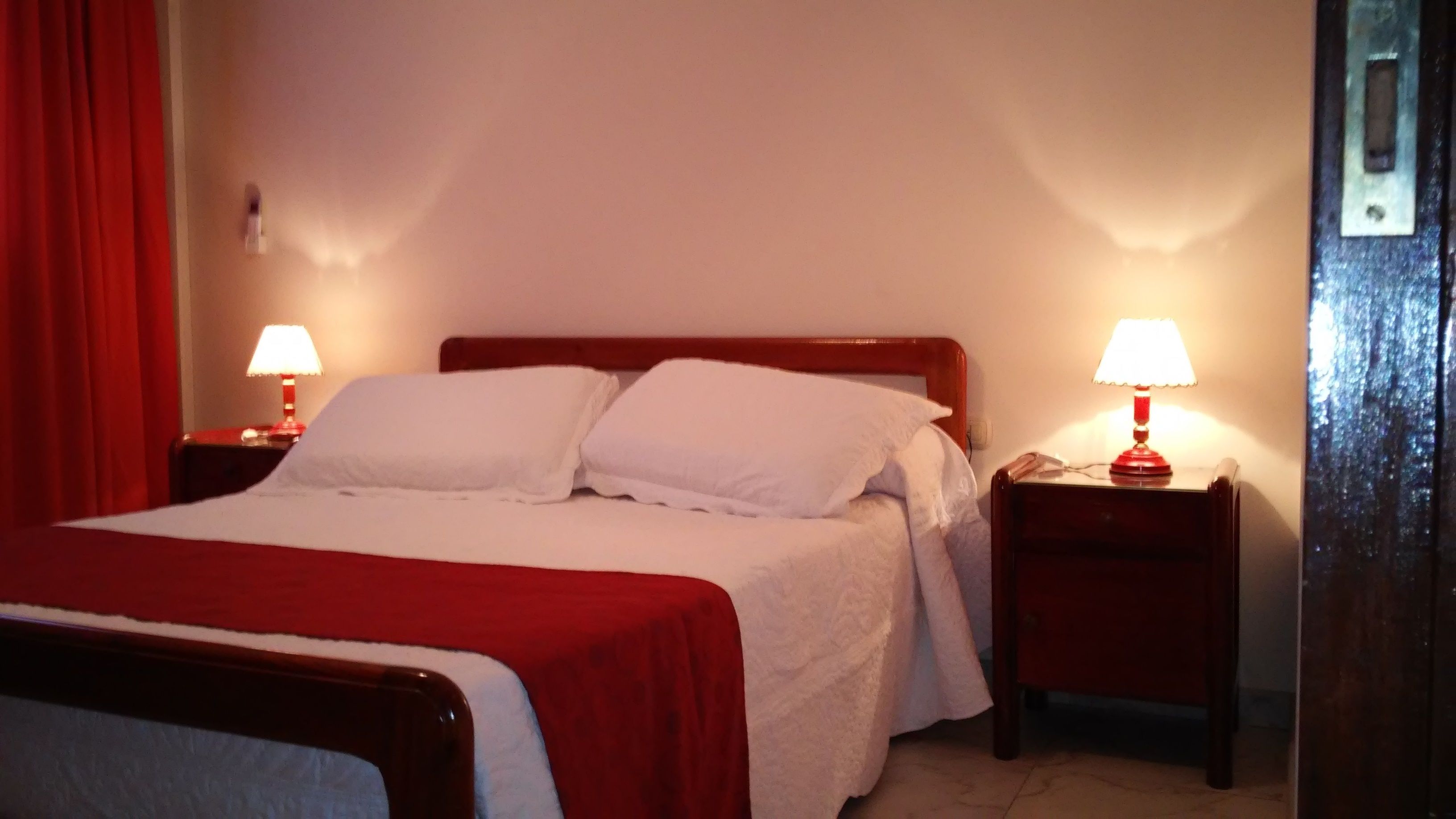 2 bedrooms, blackout curtains, iron/ironing board, rollaway beds