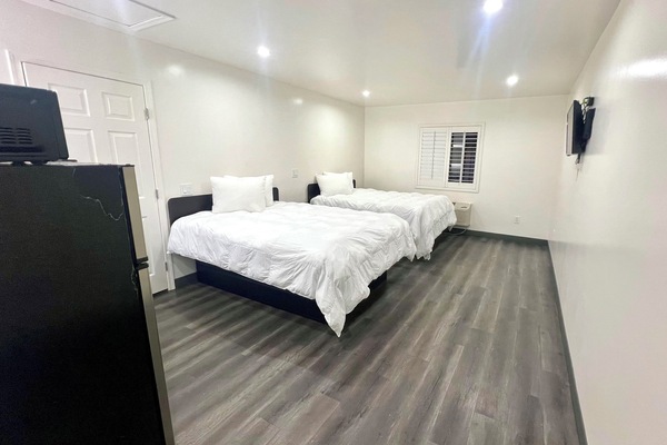 Deluxe Room, 2 Queen Beds, Non Smoking | Iron/ironing board, bed sheets