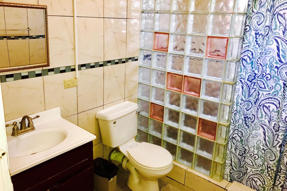 Shower, rainfall showerhead, towels