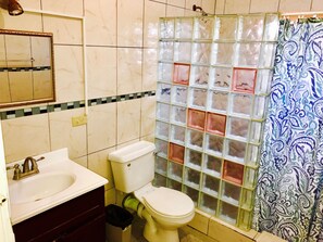 Shower, rainfall showerhead, towels