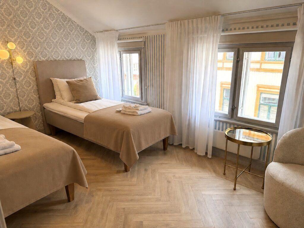 Deluxe Suite, 3 Bedrooms, Balcony, City View | Pillow-top beds, blackout curtains, soundproofing