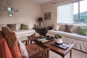 Deluxe Apartment, 2 Bedrooms | Living area | Flat-screen TV - Turtle Towers Apartments (Ocho Rios)