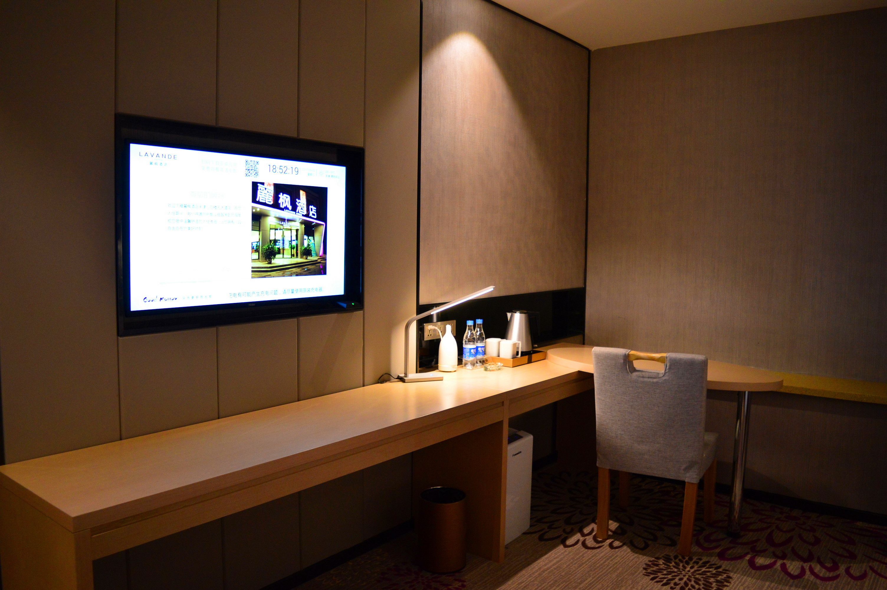 Executive Double Room | Living area | 40-inch LCD TV with cable channels, TV