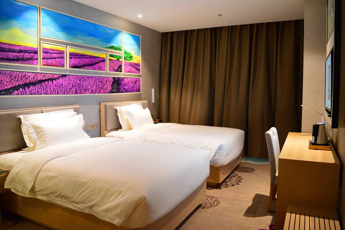 Business Twin kamer | Een minibar, een bureau, verduisterende gordijnen, gratis wifi