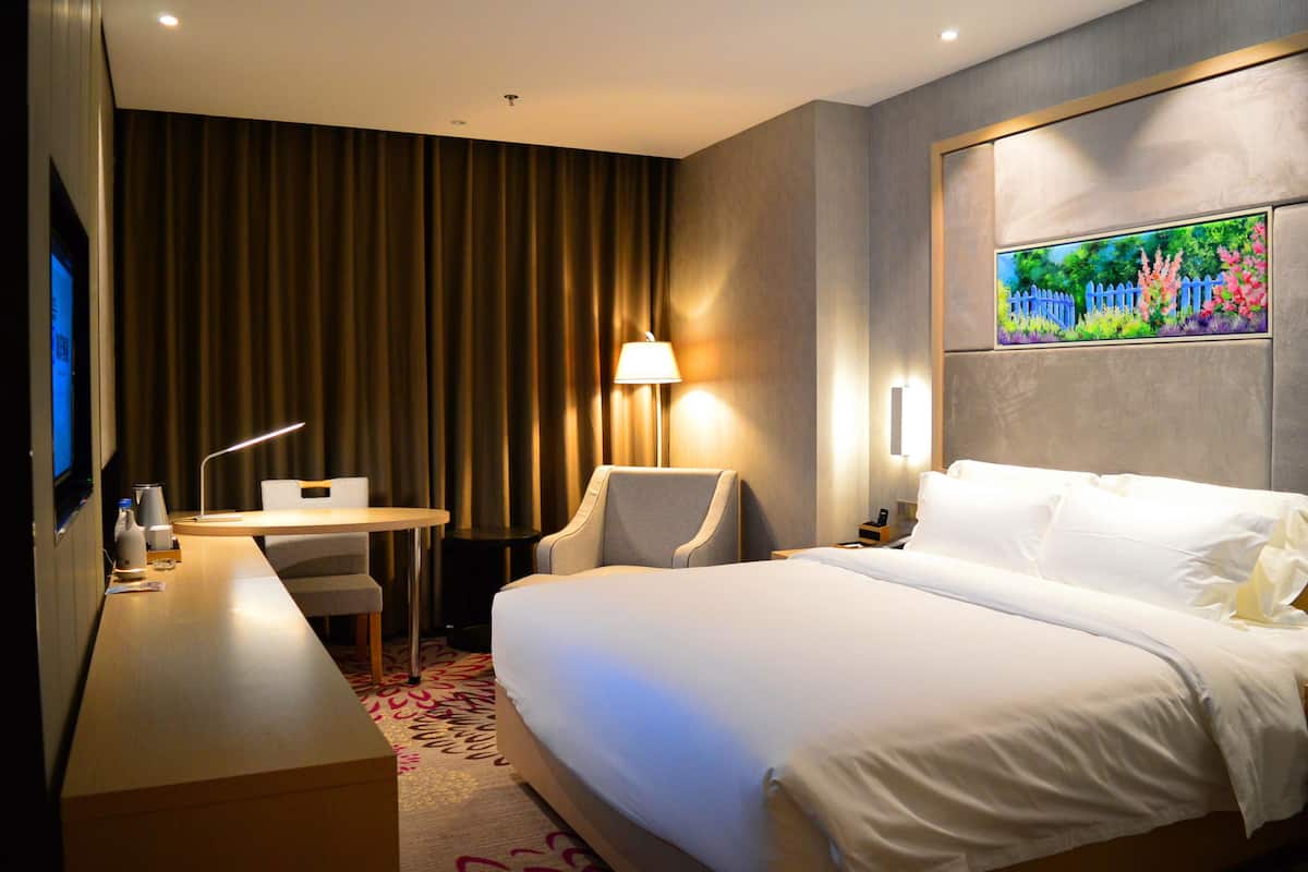 Executive tweepersoonskamer | Een minibar, een bureau, verduisterende gordijnen, gratis wifi