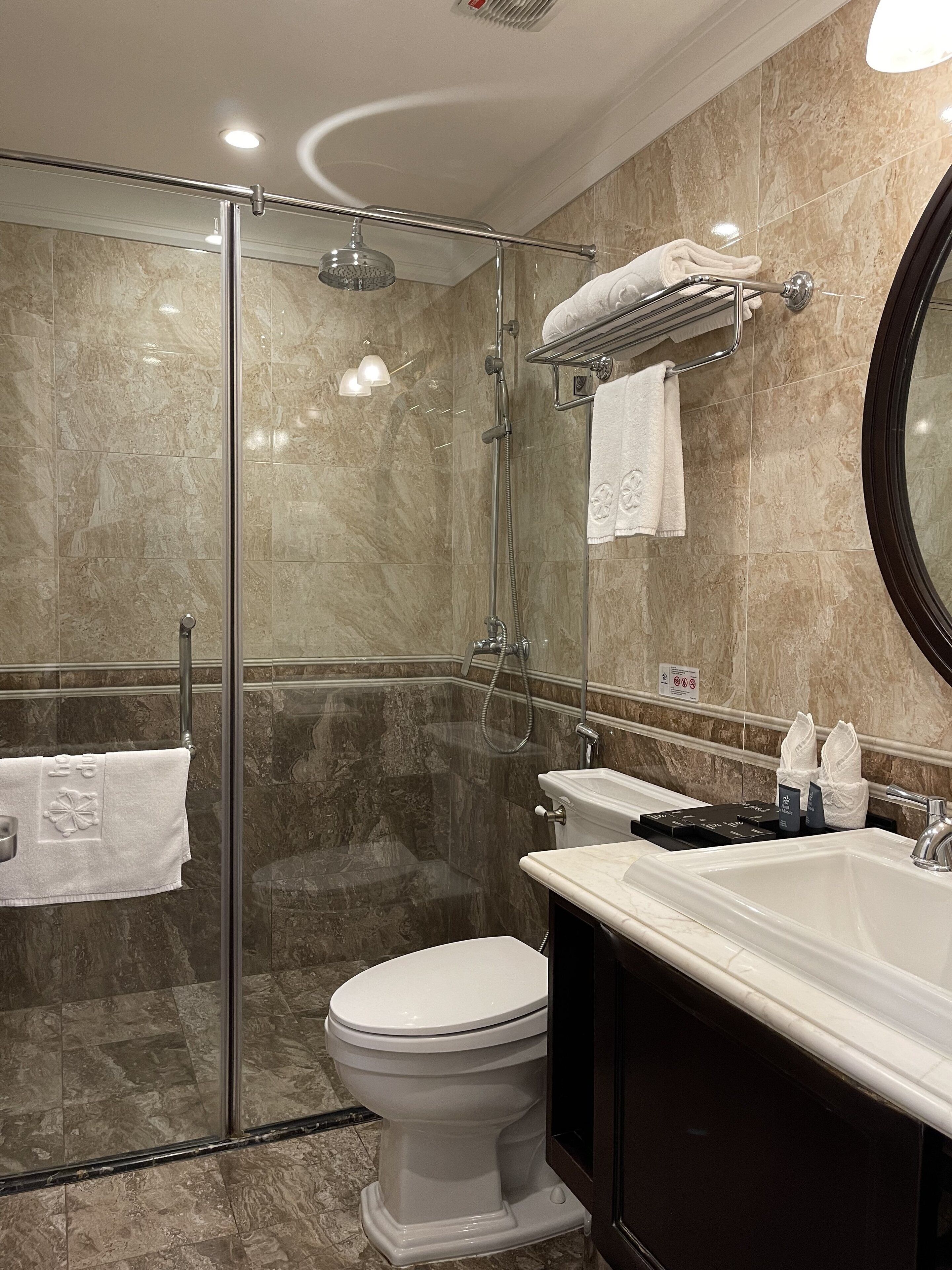 hydromassage showerhead, designer toiletries, hair dryer, bathrobes