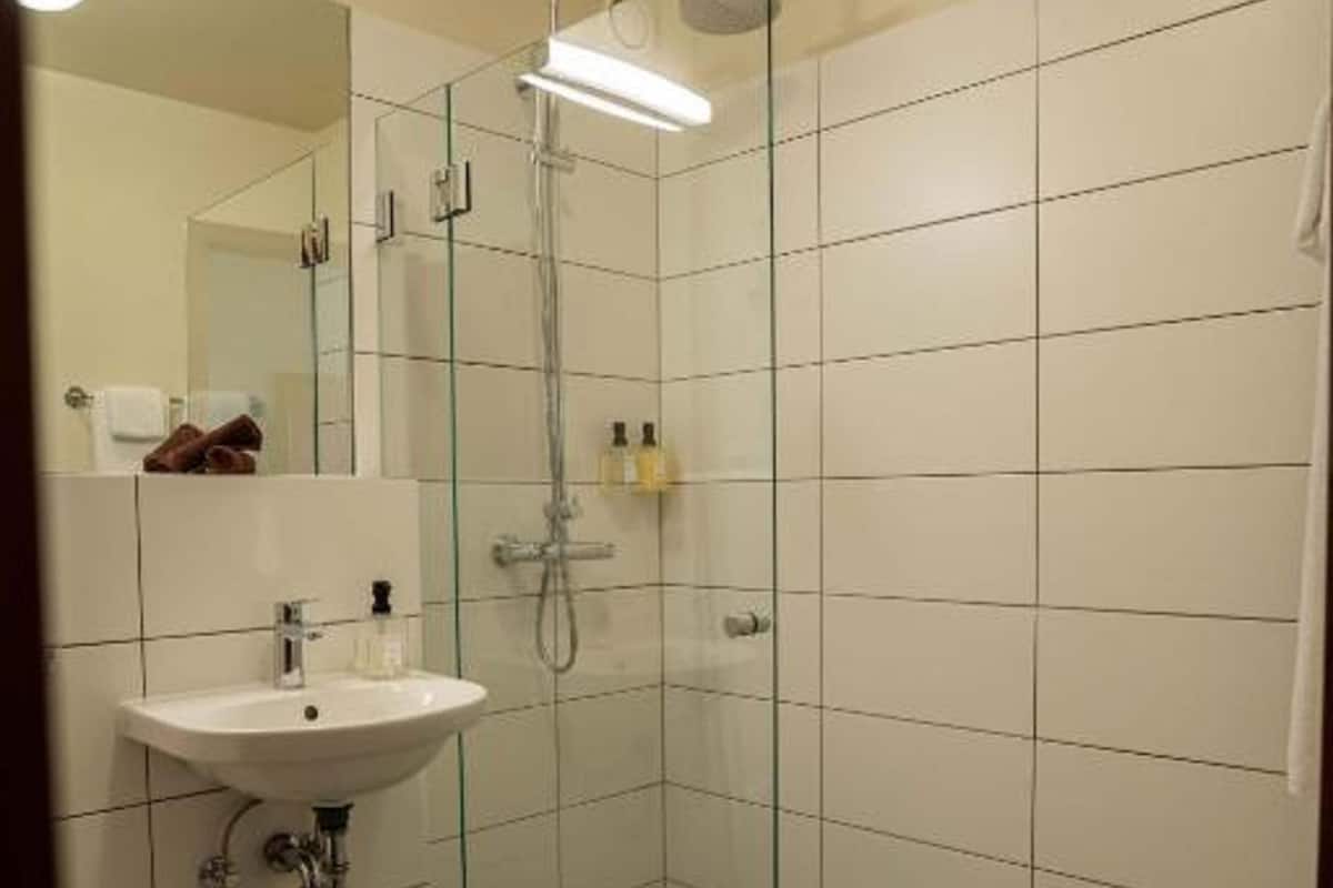 single room | bathroom | shower, free toiletries, hair dryer, towels