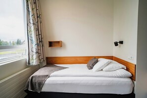Einzelzimmer | Schreibtisch, Verdunkelungsvorhänge, schallisolierte Zimmer
