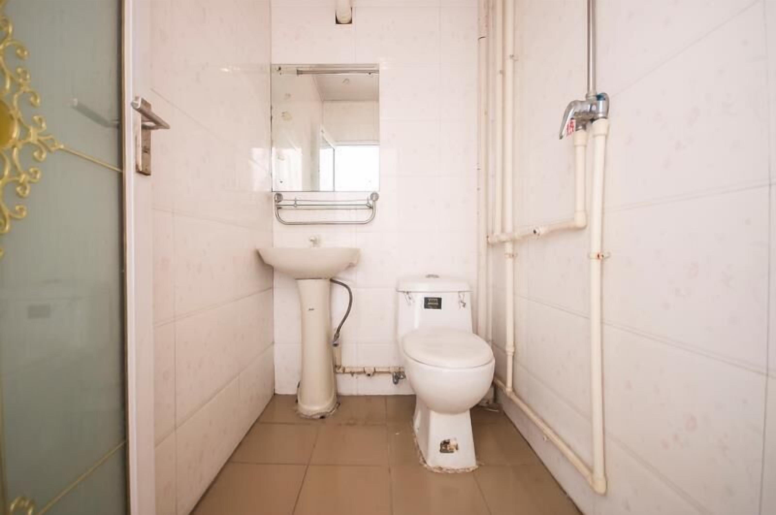 Shower, free toiletries, hair dryer, slippers