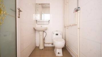 Shower, free toiletries, hair dryer, slippers