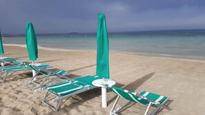 Private beach nearby, white sand, beach umbrellas, beach towels