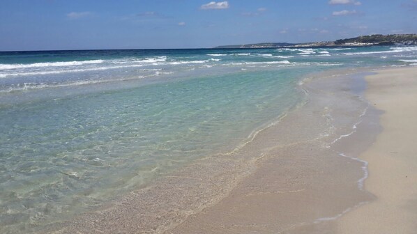 Private beach nearby, white sand, beach umbrellas, beach towels