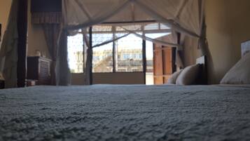 Family Room, 2 Double Beds | In-room safe, desk, free WiFi