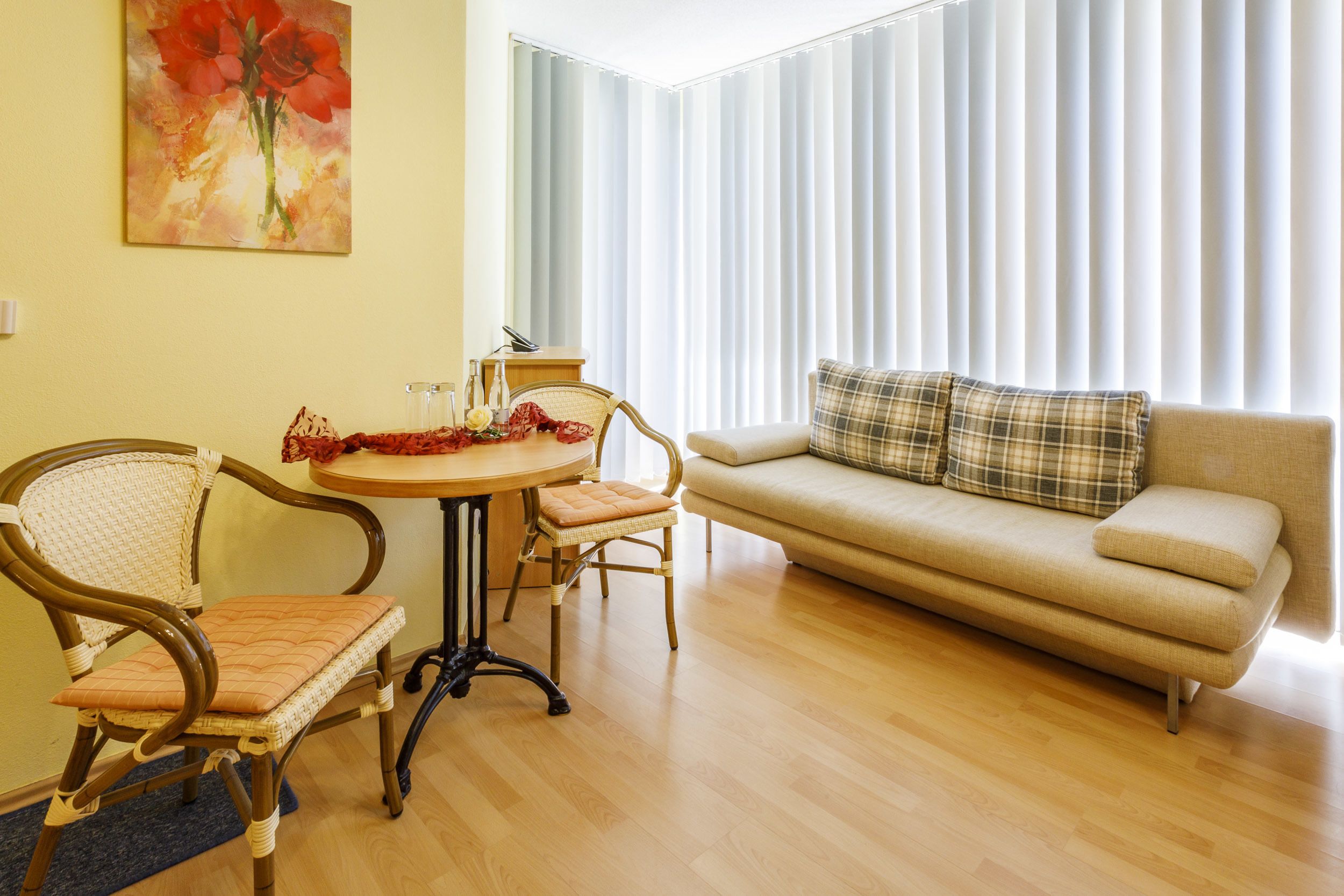 comfort double room | living area | flat-screen tv