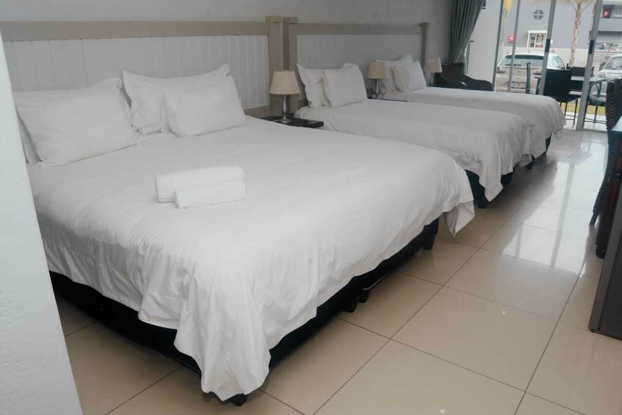 Family Room | Desk, laptop workspace, blackout drapes, iron/ironing board