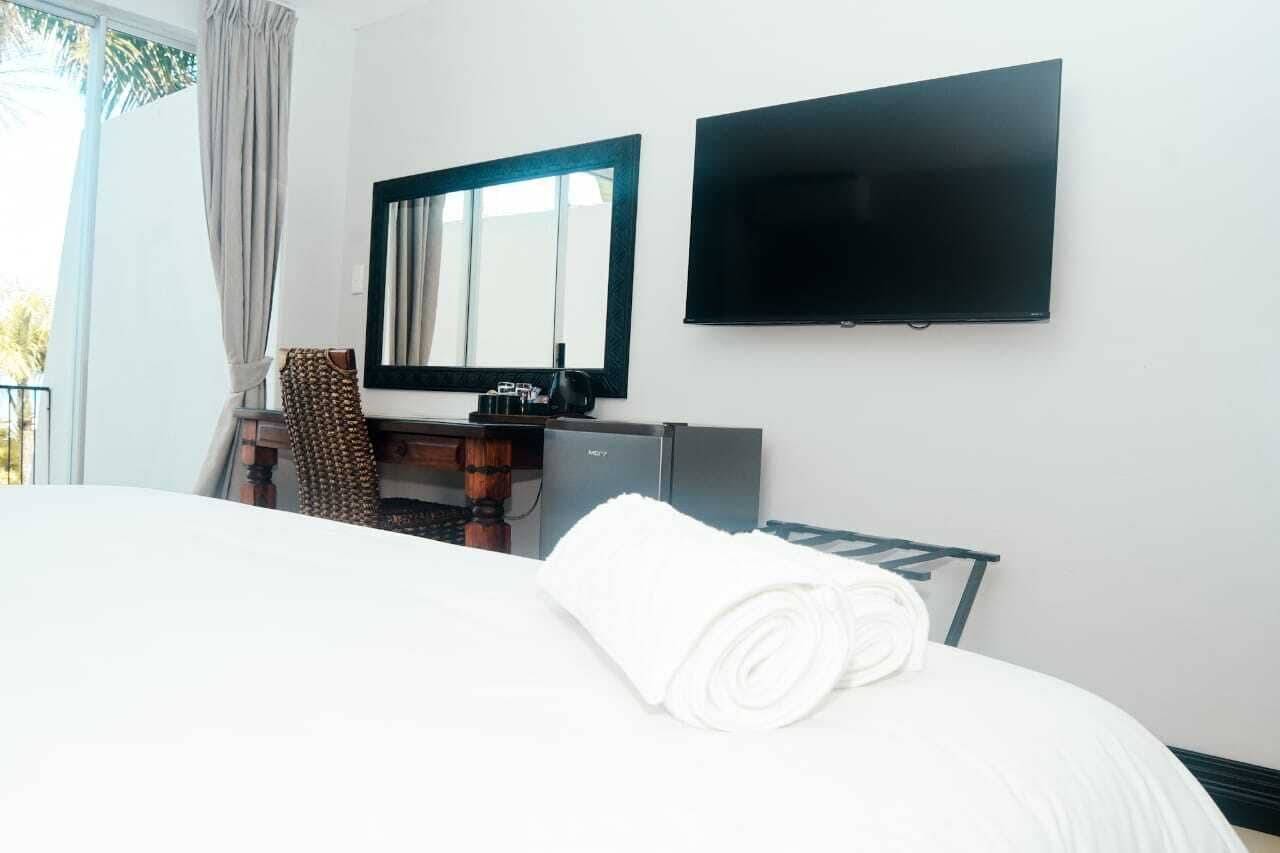 Superior Room | Desk, laptop workspace, blackout drapes, iron/ironing board