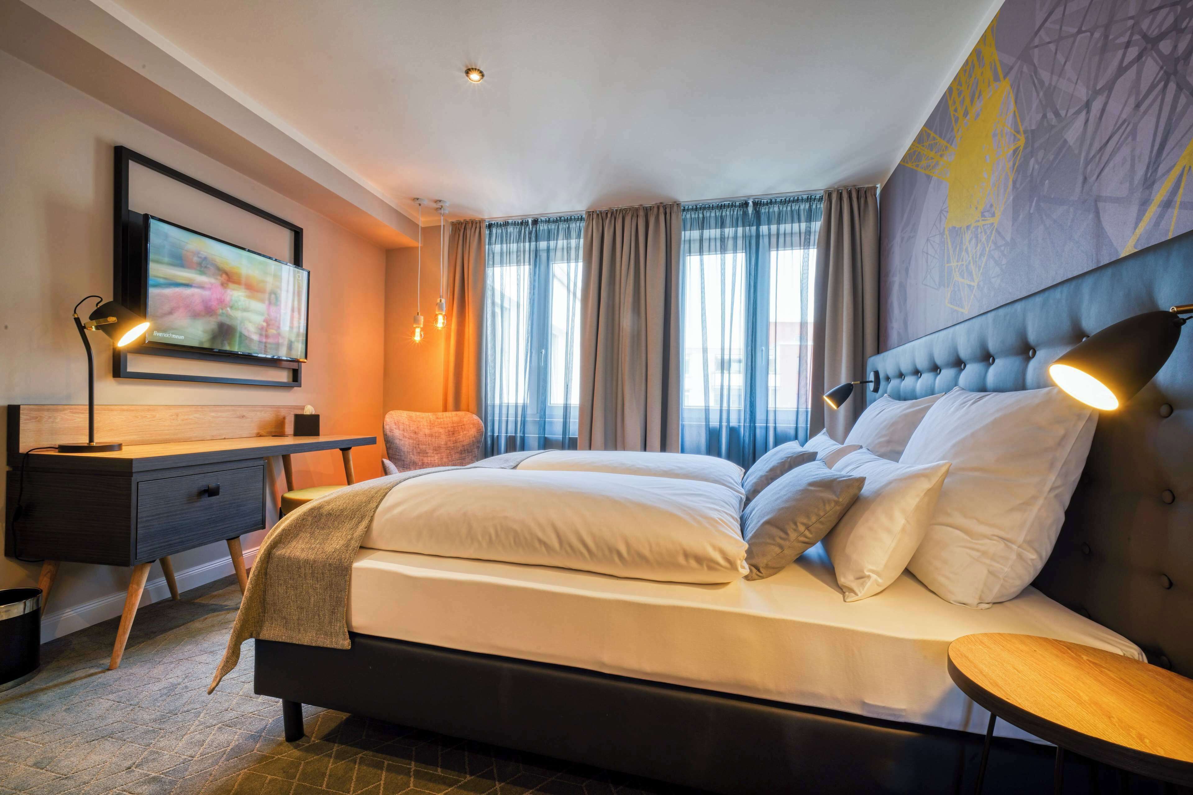 premium bedding, desk, soundproofing, free wifi