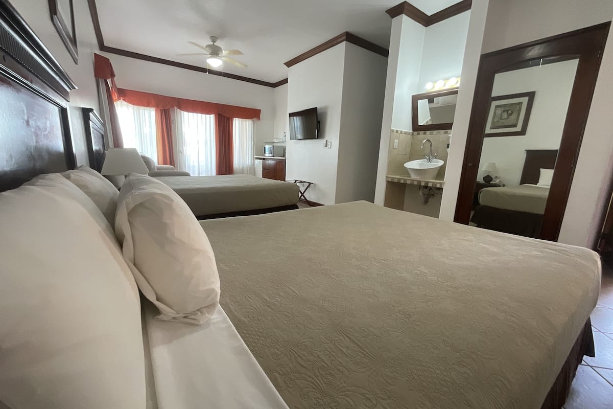 junior room, 1 bedroom, beach view | 1 bedroom, in-room safe, blackout curtains, free wifi