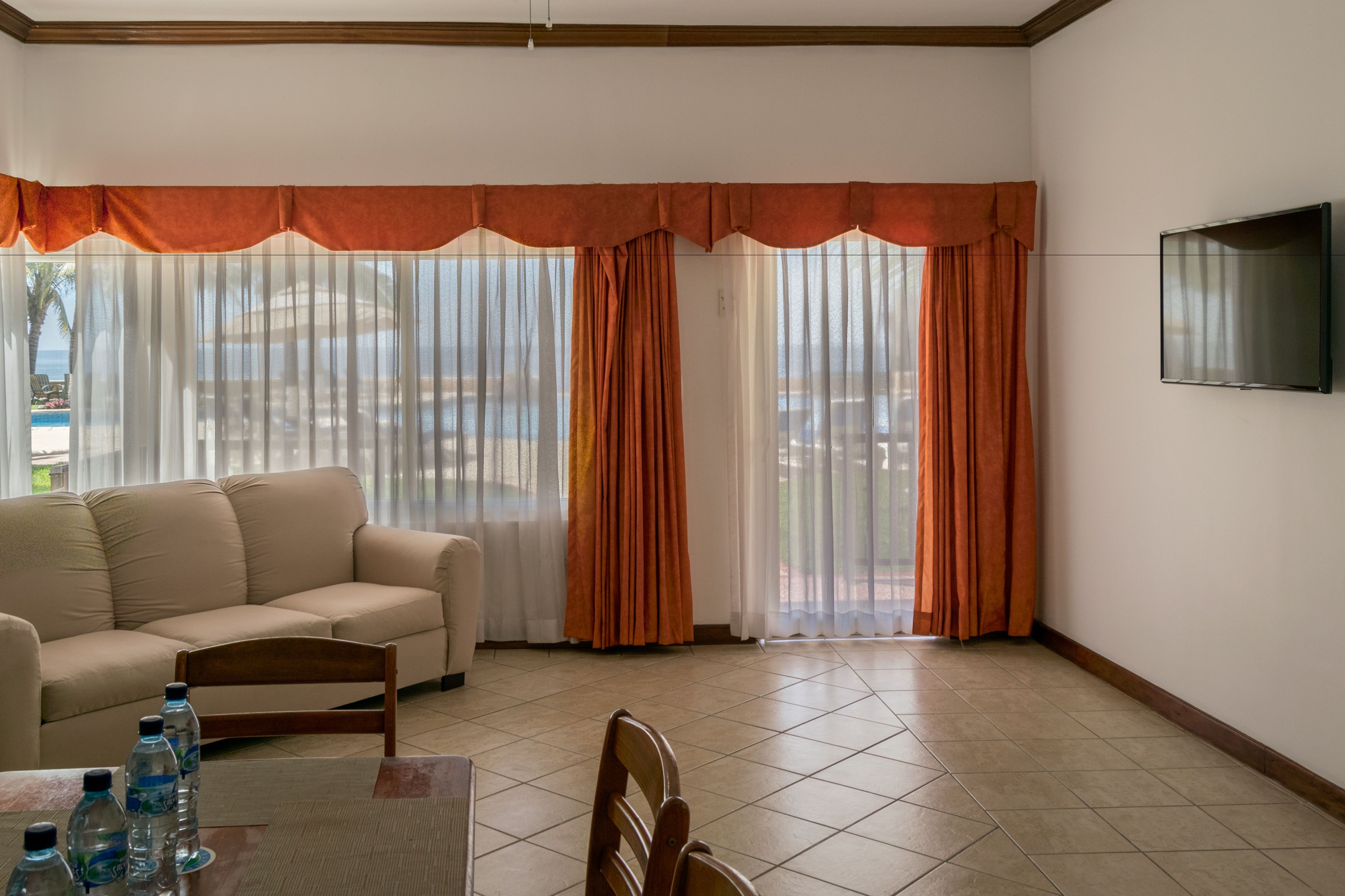 luxury suite, kitchen, poolside, 1st floor. | living area | tv