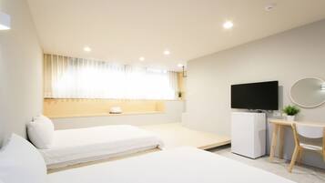 Standard Quadruple Room, 2 Double Beds, Private Bathroom | Desk, blackout drapes, free WiFi, bed sheets