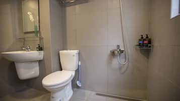 Standard Double Room, Private Bathroom | Bathroom | Shower, free toiletries, hair dryer, slippers