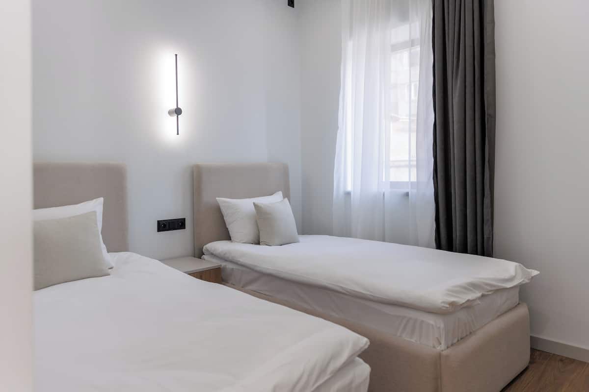 Appartement familial | Draps en coton égyptien, literie de qualité, système d’insonorisation