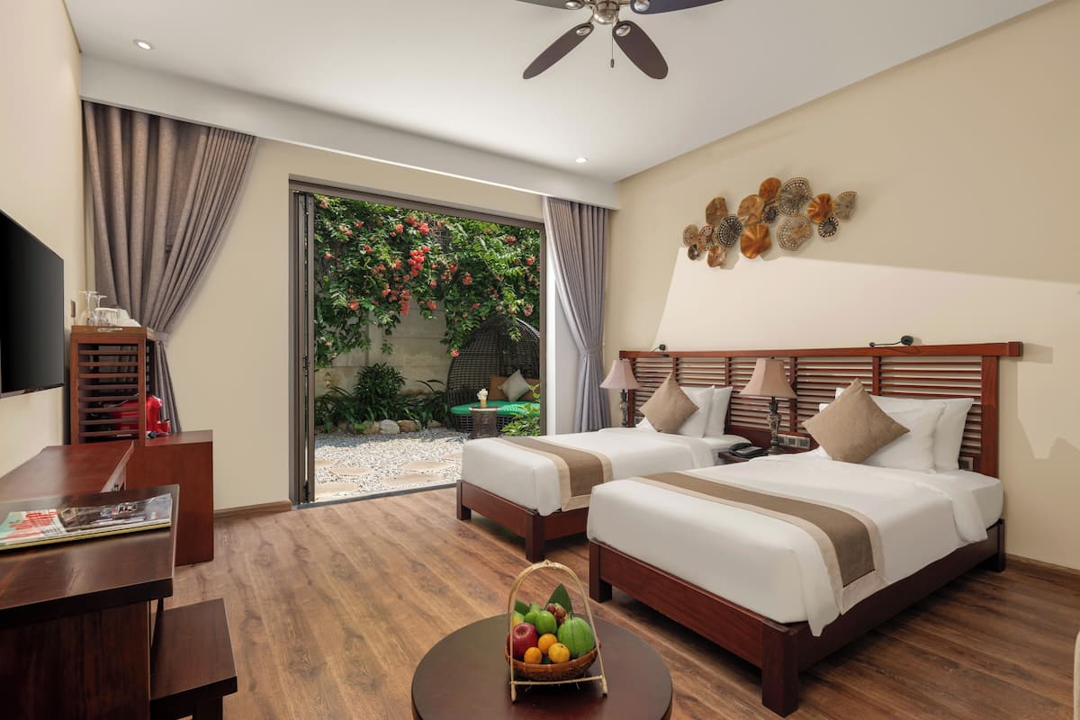 Chambre Deluxe Double ou avec lits jumeaux, baignoire, vue jardin (Private Garden) | 2 chambres, surmatelas, mini-bar avec articles gratuits