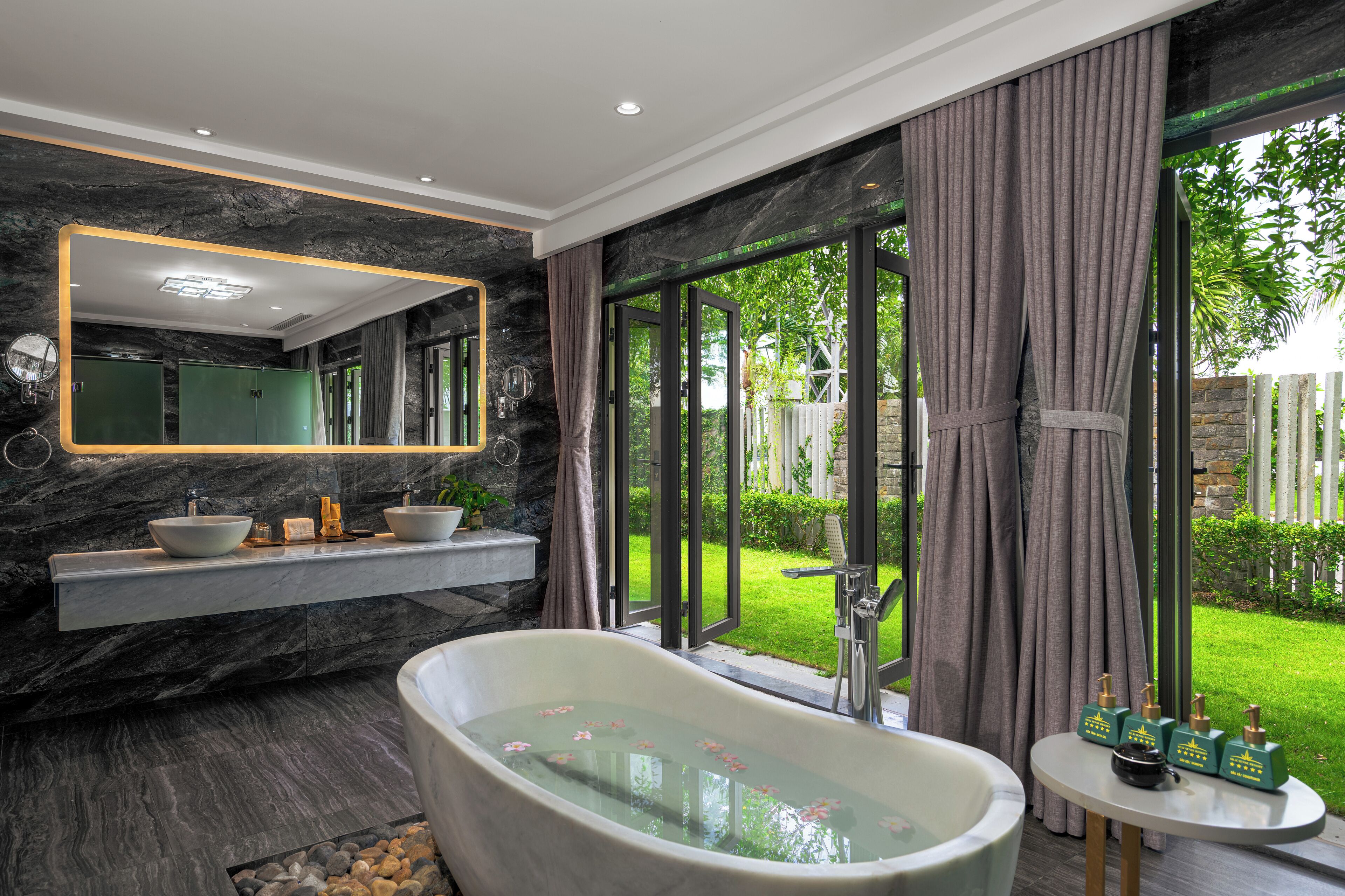 presidential suite | bathroom | designer toiletries, hair dryer, bathrobes, slippers