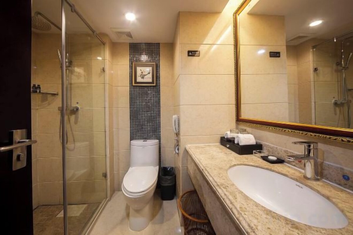 Baño | Secador de pelo y zapatillas