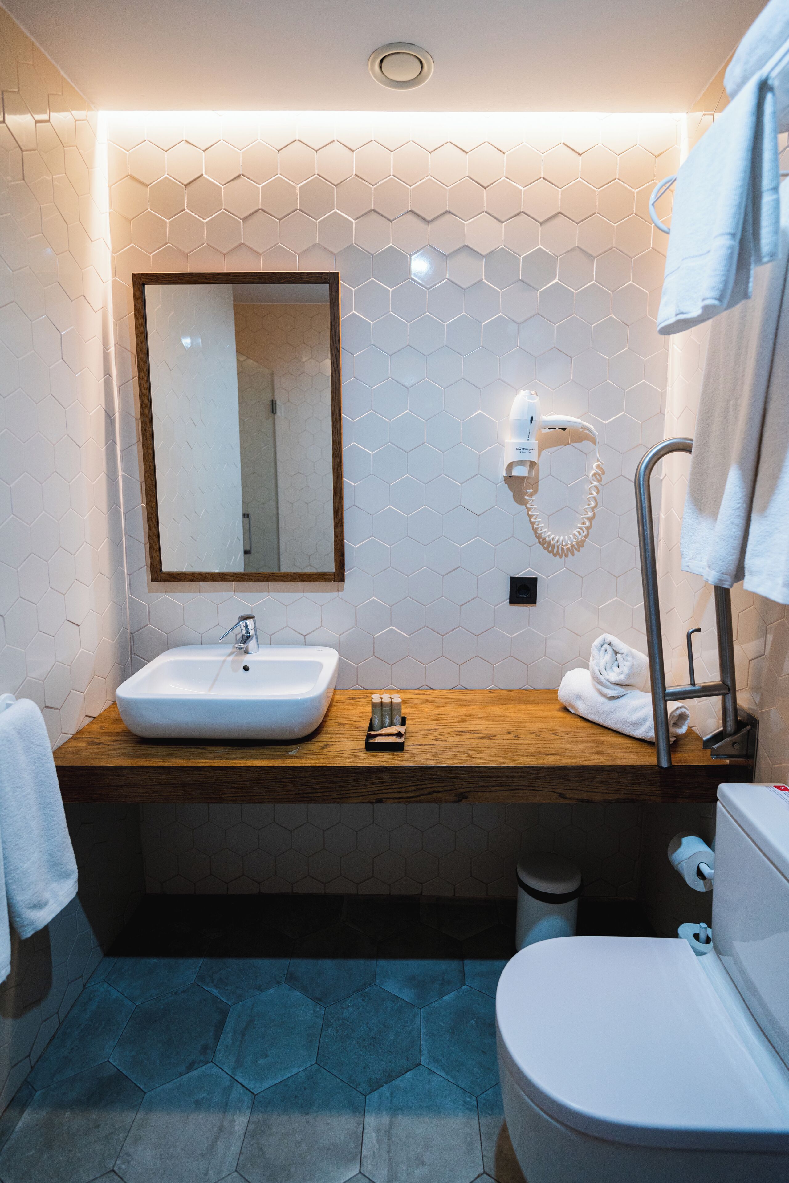 family room | bathroom | shower, free toiletries, hair dryer, towels