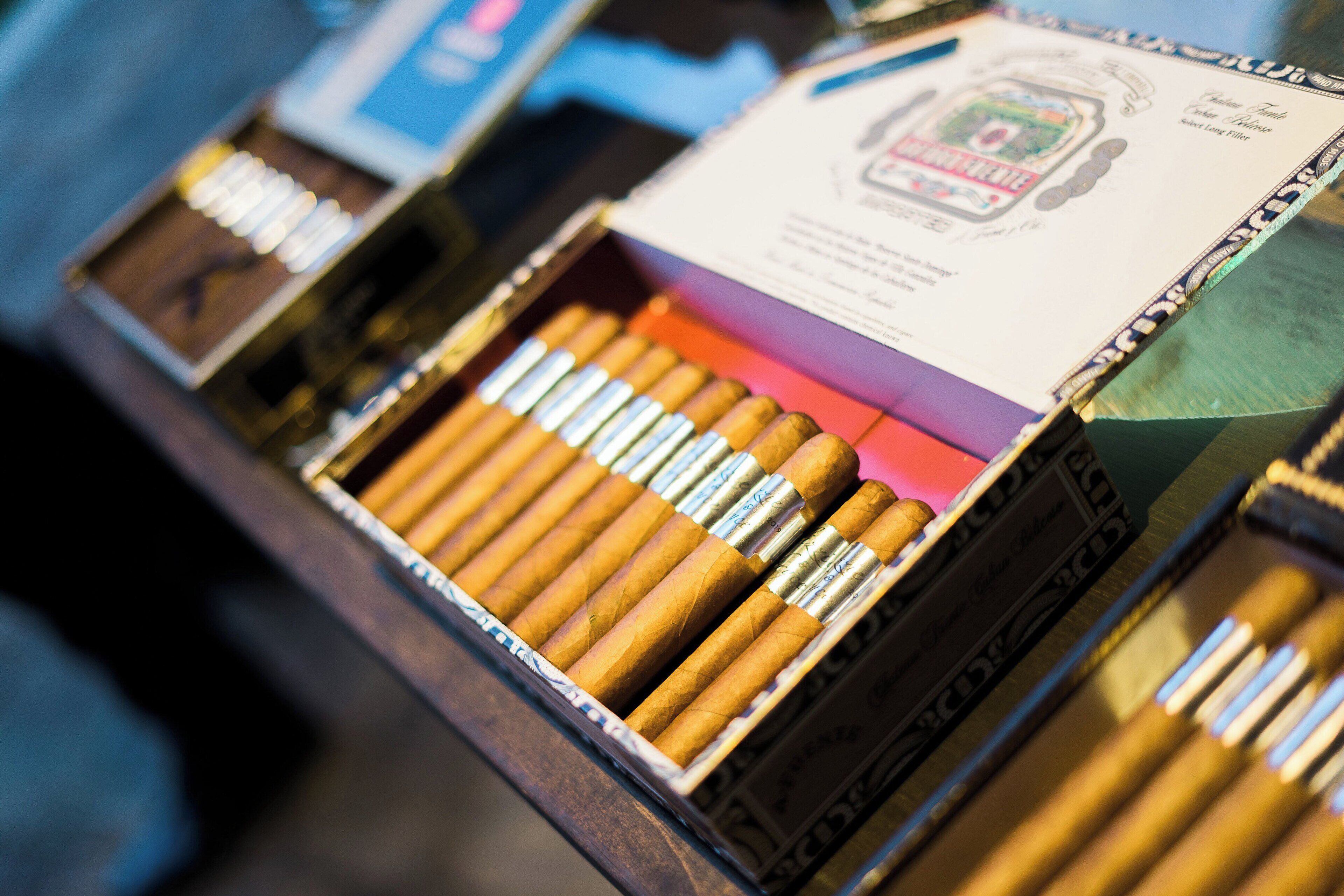 A cigar box with cigars and a label.