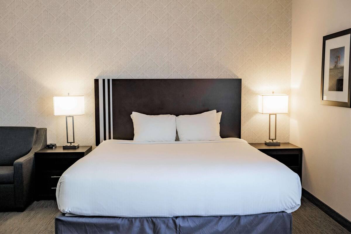 Premium bedding, desk, laptop workspace, soundproofing