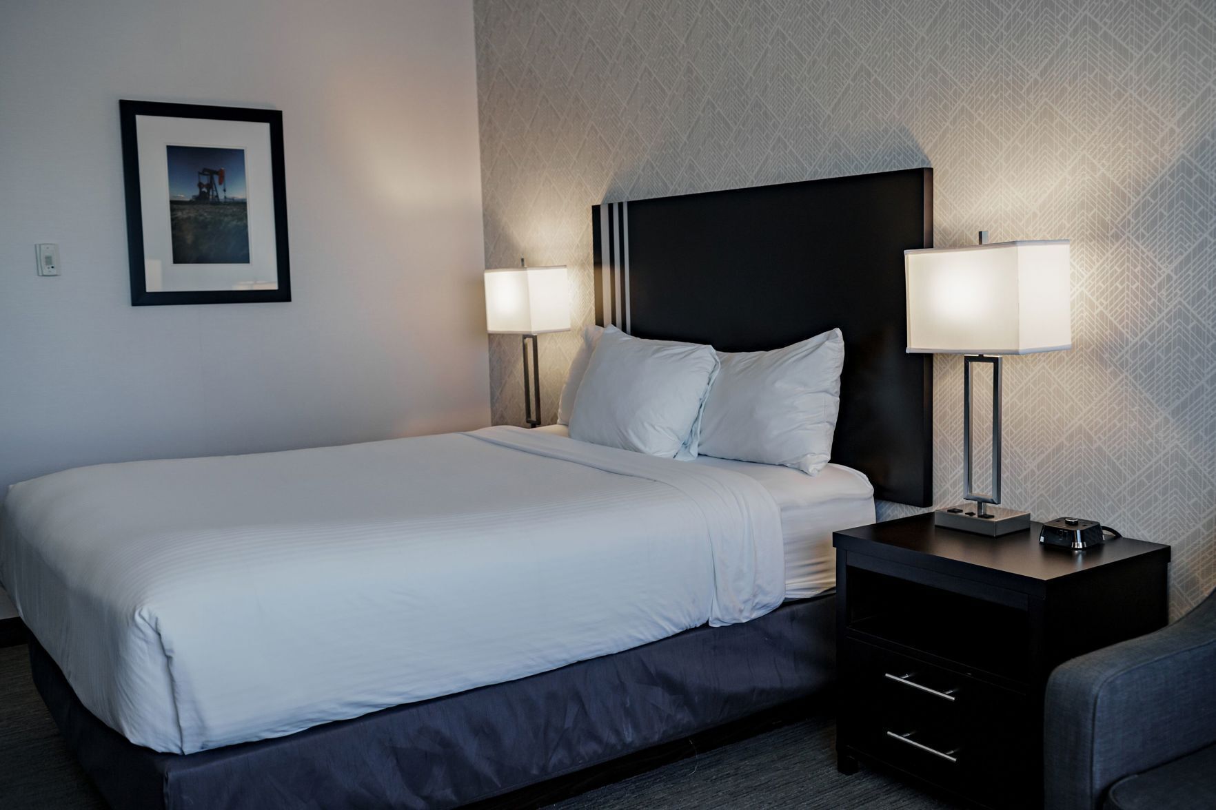 Premium bedding, desk, laptop workspace, soundproofing