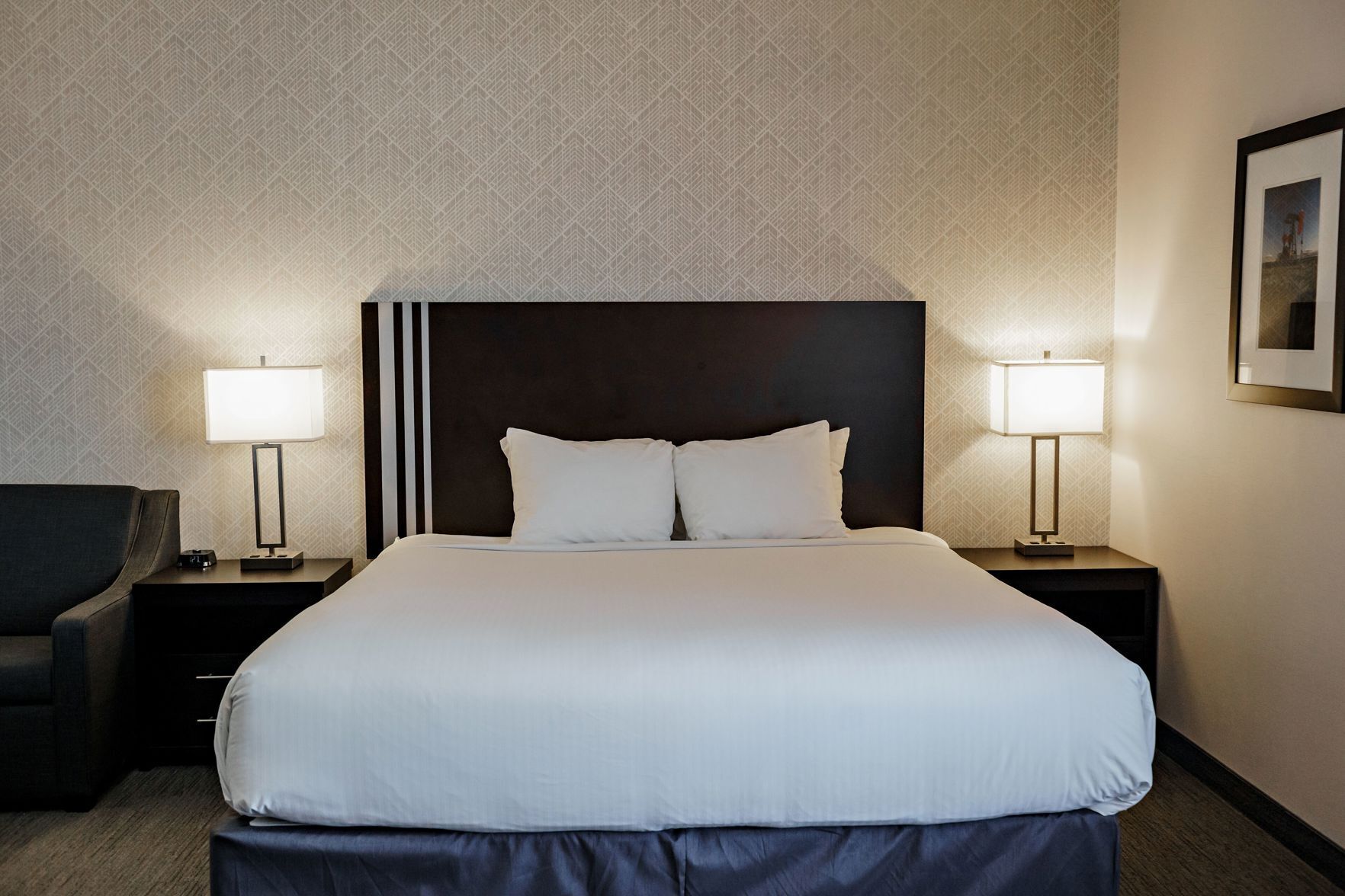 Premium bedding, desk, laptop workspace, soundproofing