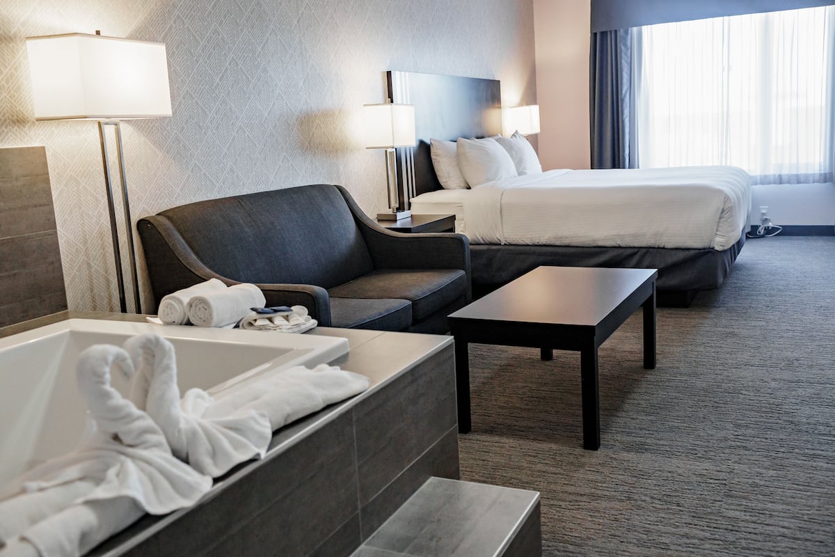 room, 1 king bed with sofa bed, non smoking, jetted tub | premium bedding, desk, laptop workspace, soundproofing