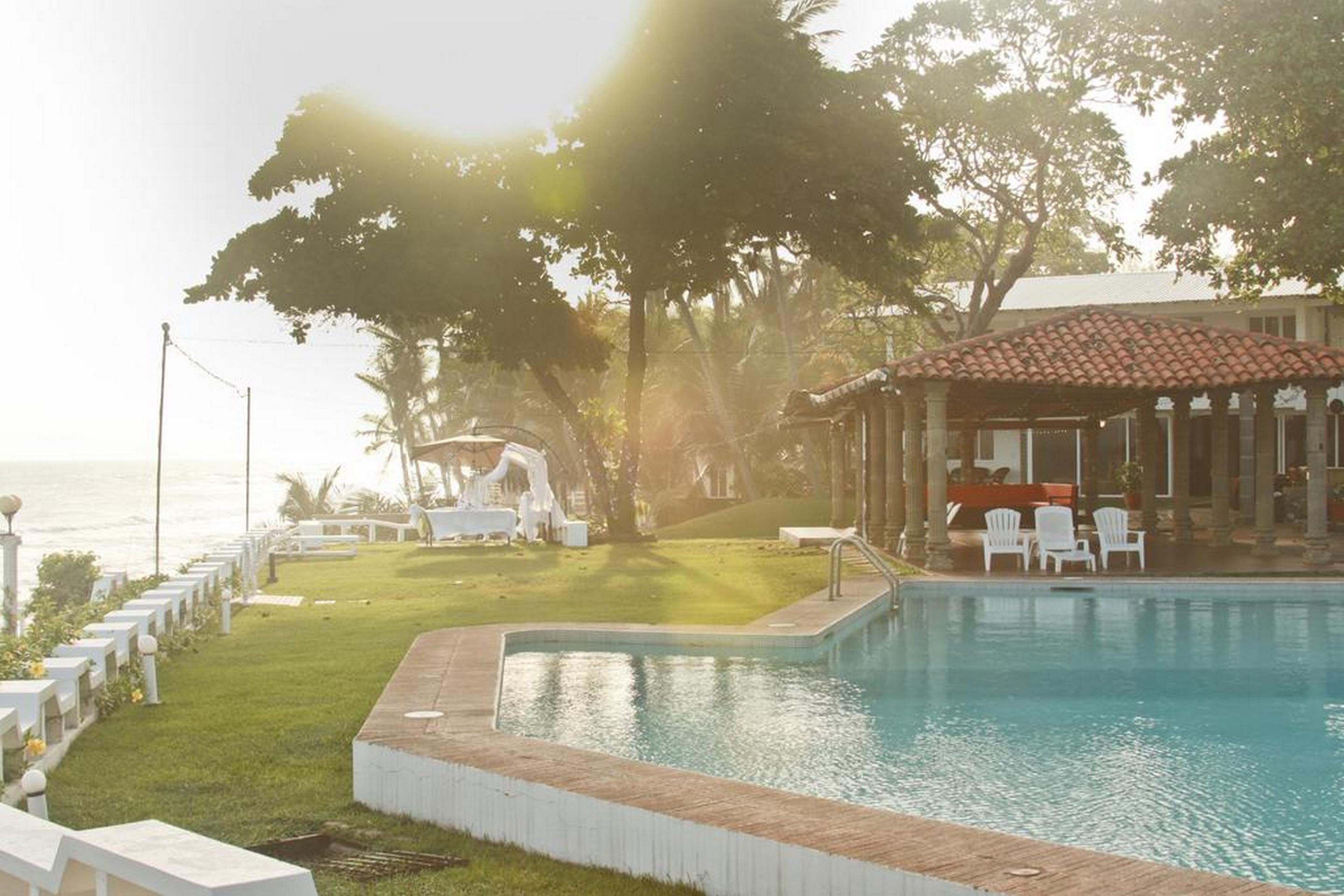 Outdoor pool, pool umbrellas, pool loungers