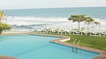 Outdoor pool, pool umbrellas, sun loungers