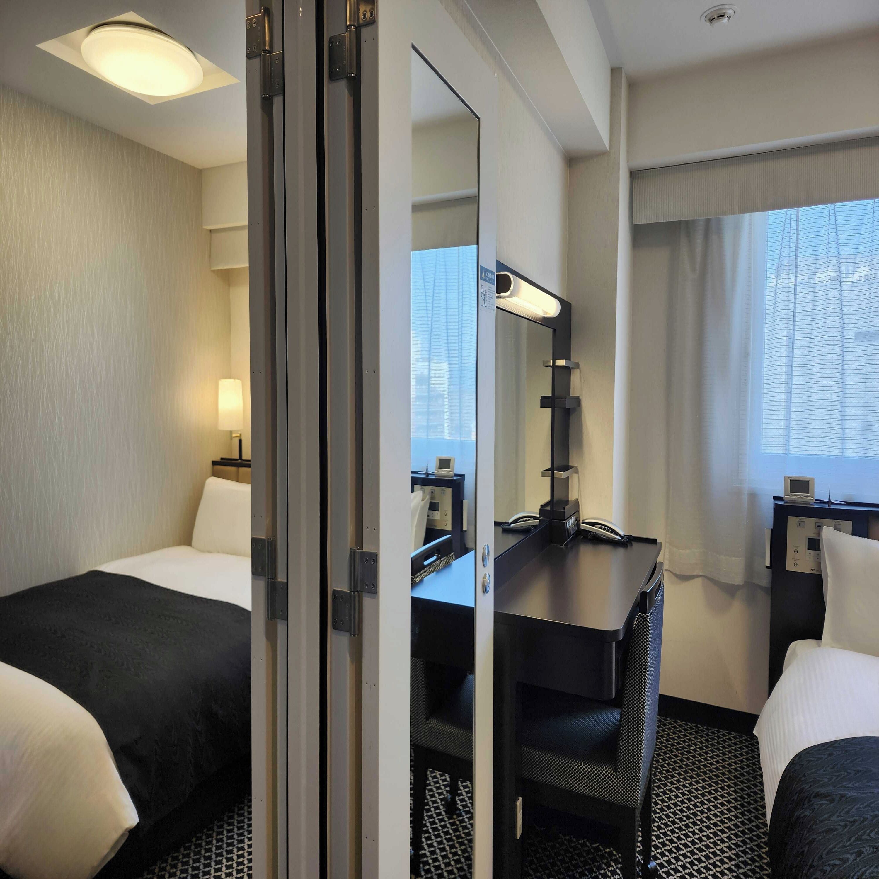 Down comforters, desk, free WiFi, bed sheets