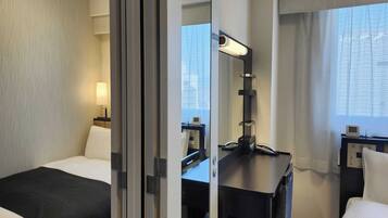 Down comforters, desk, free WiFi, bed sheets