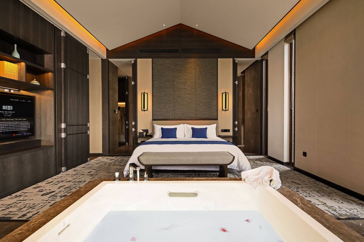 Separate bathtub and shower, rainfall showerhead, designer toiletries
